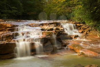 Wide waterfall with blurred motion on Muddy Creek running into Cheat River off Route 26 in Preston County West Virginia