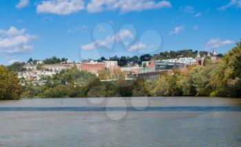 View of the downtown area of Morgantown WV and campus of West Virginia University from river bank
