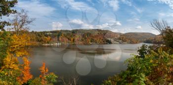 Panorama of the autumn fall colors surrounding Cheat Lake near Morgantown, West Virginia