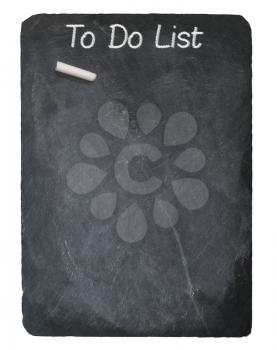 To Do List text message written in chalk on a chalky natural slate blackboard isolated against white background with copy space