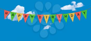 High resolution colorful sack cloth pennants with the letters embossed on each to create pennant flag message of Happy Birthday in the sky