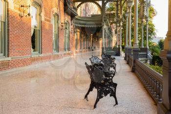 Cast iron chairs on the marble patio or balcony of Henry B Plant museum is moorish inspired architecture part of the University of Tampa.