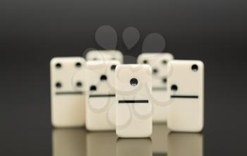 Number One domino in front of peers as concept image for success, innovation, leadership, winning and leader of the pack
