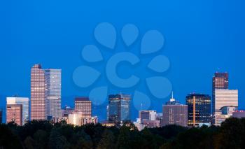 City skyline of Denver Colorado from the City Park taken from front of Science Museum just before sunrise