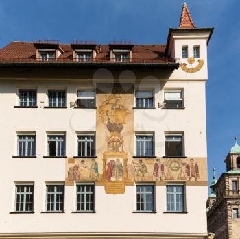 Wall painting or mural of explorers on side of Chamber of Commerce in Nuremberg, Germany