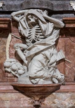 Statue of skeleton death in St Emmeram Abbey or Basilica in Regensburg, Bavaria, Germany