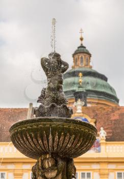 Fountain of Melk Abbey a Benedictine monastery overlooking river Danube in Melk, Austria