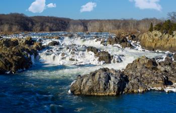 Great Falls on Potomac river outside Washington DC in winter with ice forming on the cascades and snow on the rocks
