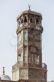 Antique brass metal clock tower of Alabaster Mosque or Mosque of Muhammad Ali Pasha in the Citadel in Cairo Egypt. Clocktower donated by King of France in 1845