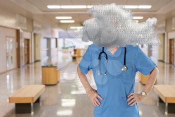 Senior male caucasian doctor with stethoscope in medical scrubs with head in cloud computing suggesting access to electronic medical records via WiFi