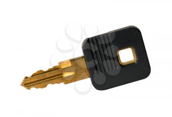 Macro of brass key with black plastic handle with clipping path against white background