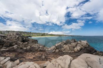 Coastline and housing development on golf course from Makaluapuna Point near Kapalua, Maui, HI, USA