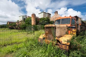 Old and abandoned rusting truck used for sugar cane to Koloa sugar mill on Hawaiian island of Kauai