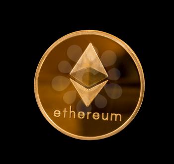 Single isolated or cutout ether or ethereum coin against a black background