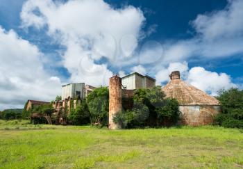 Old and abandoned buildings used for sugar cane in Koloa sugar mill on Hawaiian island of Kauai