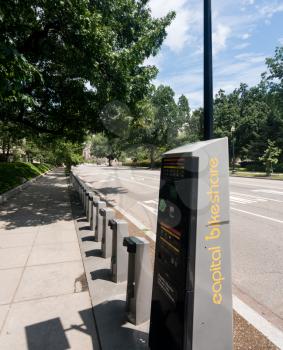 WASHINGTON, DC - JULY 8: Empty stand for Capital Bikeshare bikes on 8 July 2017 in Washington DC. It has more than 440 stations and 3,700 bicycles