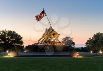 WASHINGTON, DC - JULY 9:  Floodlit Iwo Jima Marines monument at dawn on 9 July 2017 in Washington DC. The monument was dedicated in 1954.