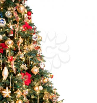 Ornately decorated christmas tree with white background for copy space for holiday message