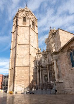 Tower and entrance to the Cathedral in old city of Valencia in Spain