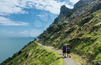LYNMOUTH, DEVON UK - JULY 24:  Hikers on the South West Coast Path on 24 July 2017 in Lynmouth, UK. The highest point on this path is 1043 feet above the sea.