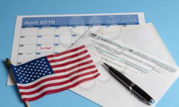 New Form 1040 Simplified for 2018 in envelope allows for filing on April 15, tax day, on a postcard