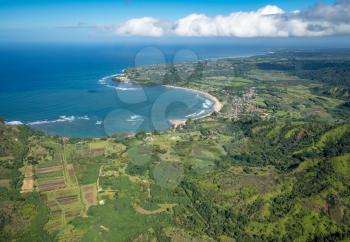 Aerial view of Hanalei Bay and Princeville on hawaiian island of Kauai from helicopter flight