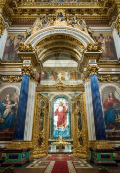 Golden doors and altar inside St Isaac's Cathedral in St Petersburg, Russia