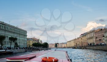 ST PETERSBURG, RUSSIA - SEPTEMBER 12: Canal boat tour on September 12, 2017 in St Petersburg, Russia. There are 342 bridges in the city.