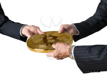 Hands of three financial traders gripping bitcoin isolated against a white background