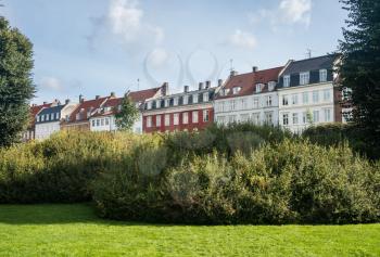 Row of colorful houses by Kings Garden in the city of Copenhagen in Denmark