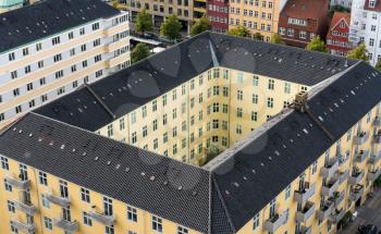 Overhead view of apartment building in Copenhagen in Denmark from top of church tower