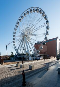 GDANSK, POLAND - 16 SEPTEMBER: The Amber Sky ferris wheel near old town on 16 September 2017 in Gdansk, Poland. The wheel opened in 2014.