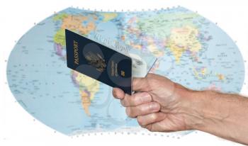 Senior hand holding US passport against blurred background of world map