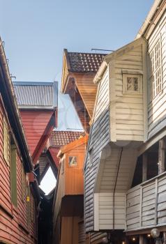 Narrow passageways between warehouses in Bryggen district in the center of Bergen, Norway