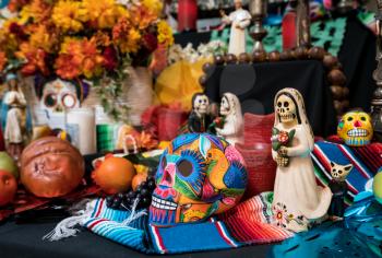 CAPISTRANO, CALIFORNIA - 1 NOVEMBER 2017: Painted skulls in display to illustrate Day of the Dead Festival.