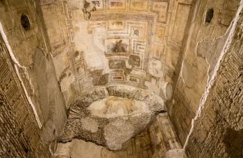 Ancient roman paintings and wall art inside the Domus Aurea palace in Rome