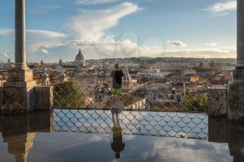 Skyline of city of Rome, Italy from the Belvedere terrace with reflection