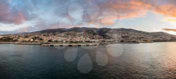 Early sunrise panorama of the town of Funchal on the island of Madiera