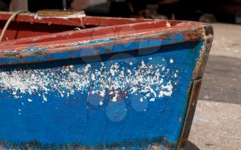 Damaged paint on fishing boat at Camara de Lobos on island of Madiera