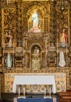 Ornate altar Church of Sao Sebastiao in Camara de Lobos near Funchal on island of Madiera