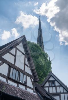 Church spire over tudor homes in Shrewsbury,  Shropshire