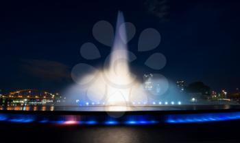 Illuminated fountain at night in Point State Park in Pittsburgh PA