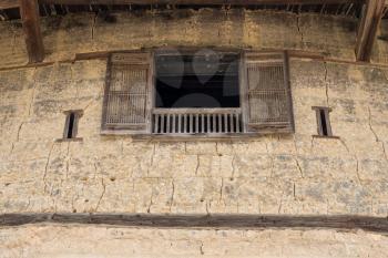 Traditional chinese shutters on window at Tulou at Unesco heritage site near Xiamen