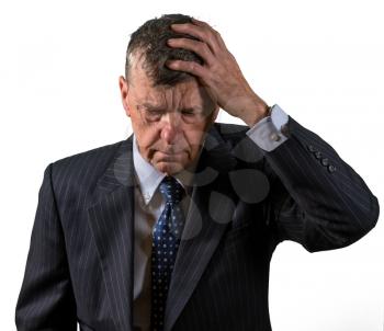 Front view and face of senior caucasian man worried and afraid with hand on head