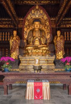 Interior of temple with Buddha at Giant Wild Goose Pagoda in Xi'an
