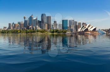 Dramatic widescreen panoramic image of the city of Sydney from Taronga Zoo  with artificial water in the harbour