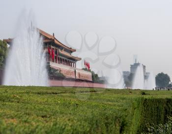Fountains frame entrance to Forbidden City in Tiananmen Square in Beijing