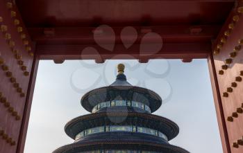 Temple of Heaven viewed through the entrance doorway and arch in Beijing, China