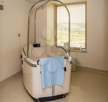 Large birth pool or birthing bath in room in Maternity ward of hospital
