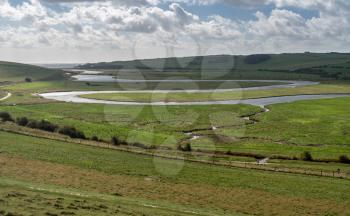Cuckmere River meanders to the ocean at Seven Sisters Country Park near Eastbourne